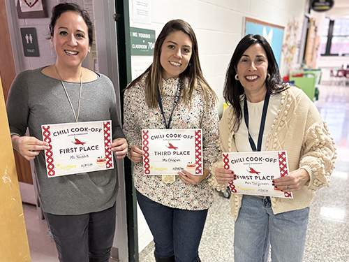 Three Sunshine club ladies holding up certificates