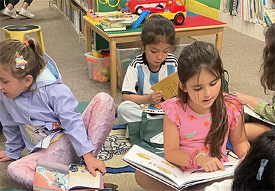 Students enjoying a visit to the local library