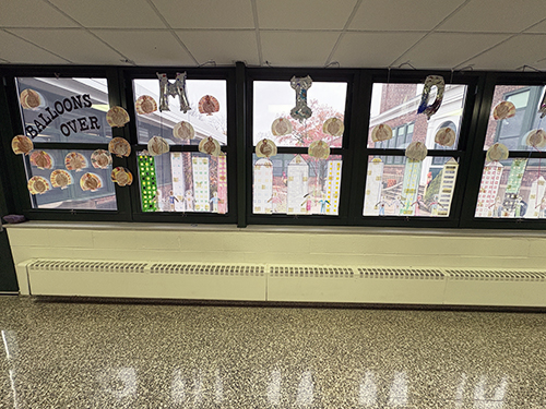 School windows decorated with student artwork