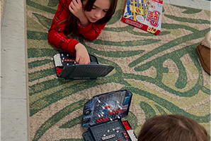 Two students playing a stratagy game