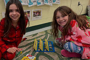 Two students playing a game